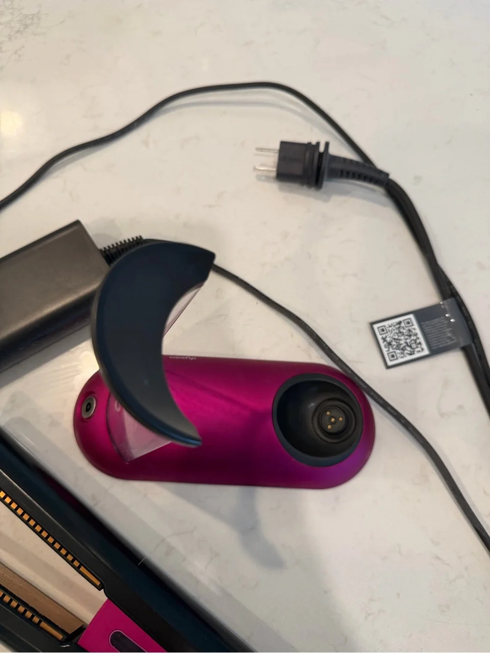 Dyson hair straightener in black and pink